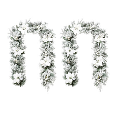 6' Pre-Lit Flocked Greenery Pine White Poinsettia Christmas Garland With Lights -  Primrue, 2D3A5F1D5A774E9BA46B0E21CA52F8FA