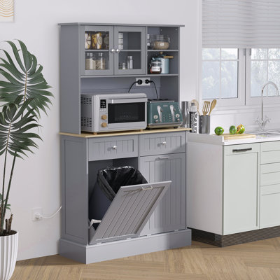68" Gray Kitchen Pantry Storage With Charging Element. Freestanding Cabinet Glass Doors & Adjustable Shelf. Versatile In Function. 2 Tilt Out Trash Cabinets. Built-In Ac Outlets And Ports. Spacious