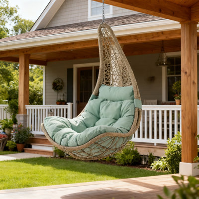 Kya Wicker Porch Swing with Cushion
