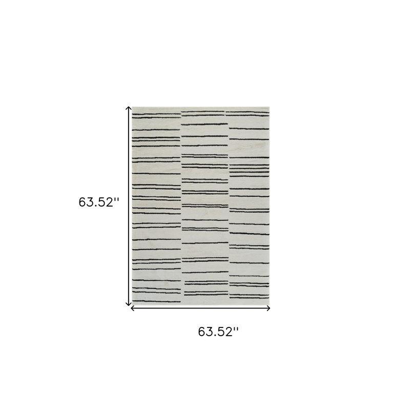 Tapis délavé usé crème et noir 5 pi x 8 pi
