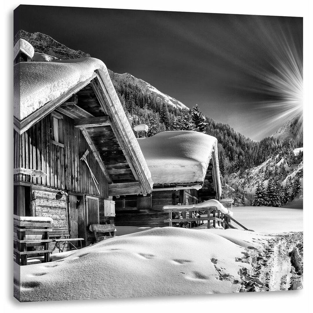 Leinwandbild Verschneite Alpenhütte