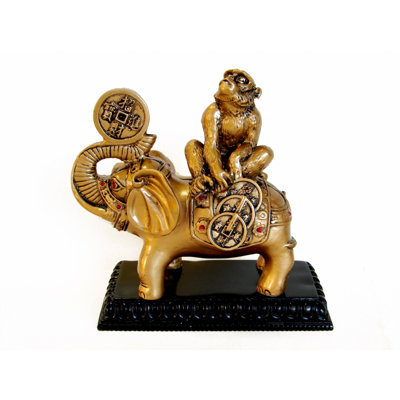 Figurine singe sur éléphant avec piédestal