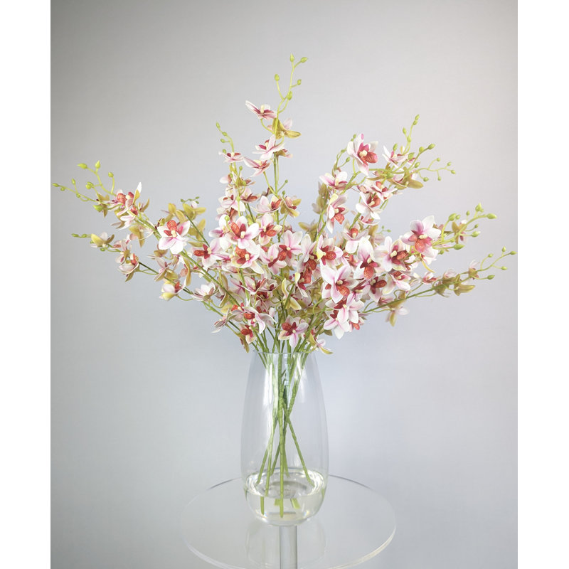 Arrangement d'orchidées dans un vase