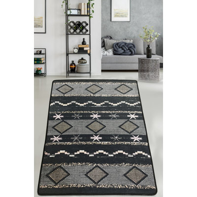Tapis géométrique rectangulaire noir / gris tissé à la machine