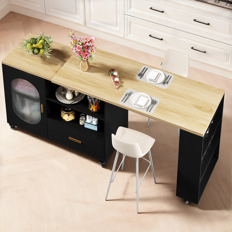 Îlot de cuisine avec table à manger extensible, armoire de rangement, tiroirs, dessus en chêne clair et piètement en chêne noir