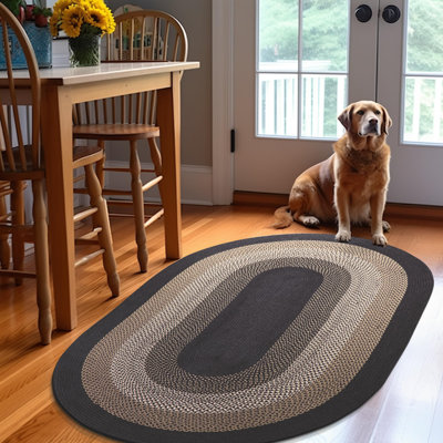 Tapis gris anthracite / brun / blanc tressé à la main Enika