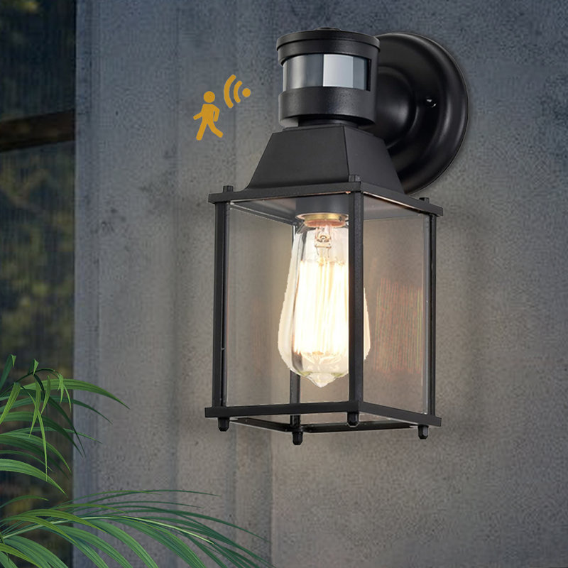 Black Hardwired Outdoor Wall Light with Motion Sensor and Glass Shade