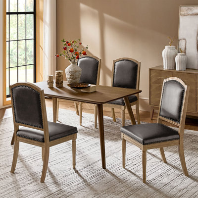 Quennel 22.5''W Transitional Faux Leather Dining Chair with Solid Wood Frame (Set of 4)
