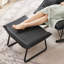 Chaise berçante simple de salon avec repose-pieds-111465368