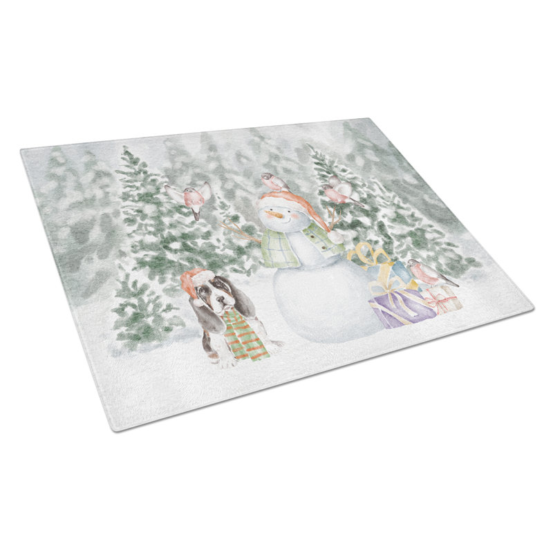 Basset hound chiot tricolore avec cadeaux de Noël planche à découper en verre