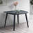 Irregular Shape Dining Table with Solid Rubberwood Construction and Sleek Black Finish Seats 4