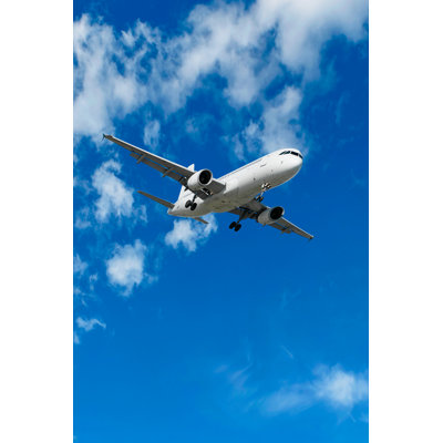 Jet Airplane Landing in Bright Sky by Sharply_Done