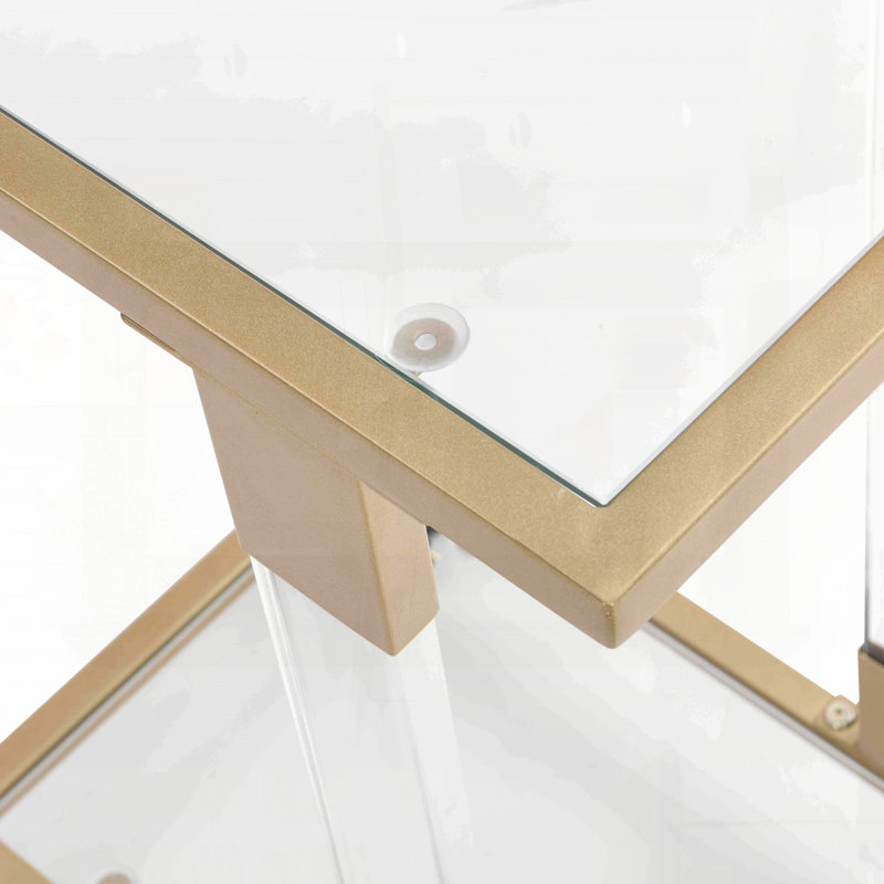 Table d'appoint en forme de C avec roulettes et structure en métal doré