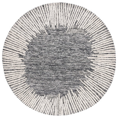 Tapis noir / ivoire en laine / coton touffeté à la main Janyla