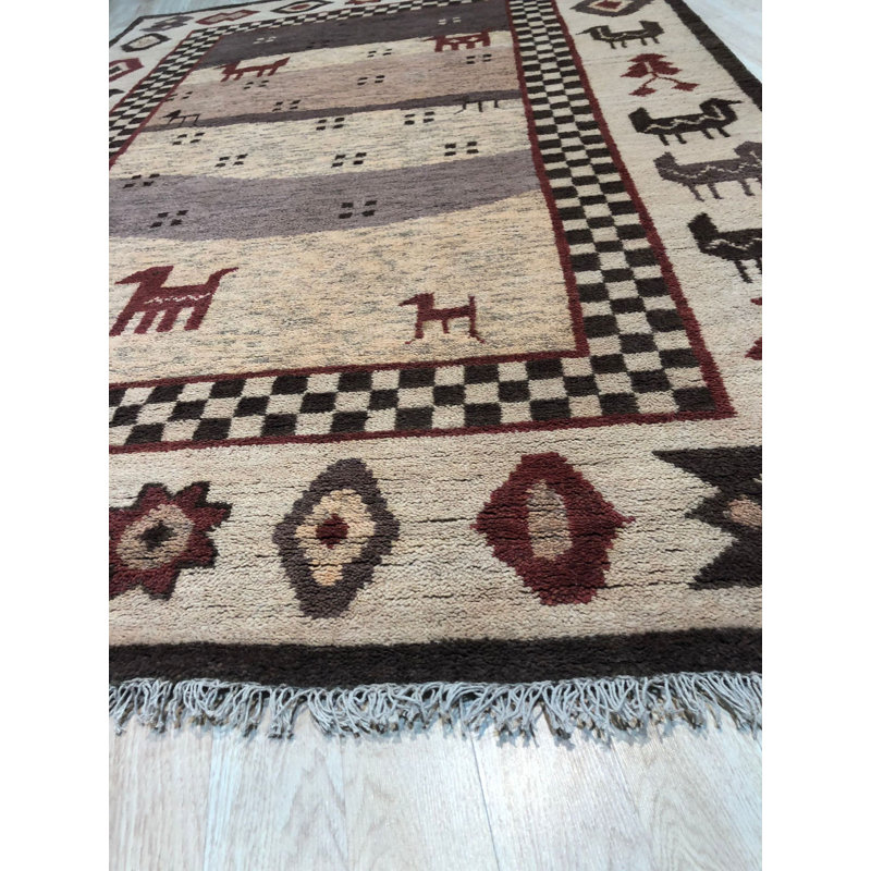Tapis beige moderne en laine noué à la main