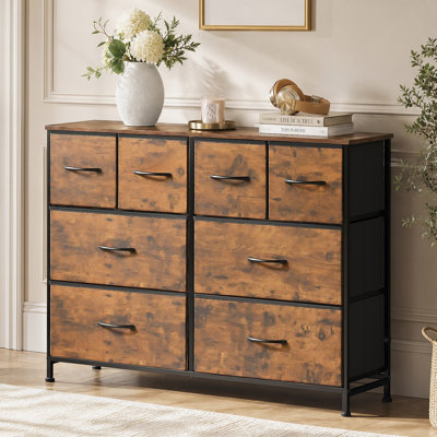 Commode double Ojaswi à 8 tiroirs pour chambre à coucher, 100 cm de largeur, brun, avec structure robuste, pouvant également servir de commode dans le salon, le dressing ou l'entrée.