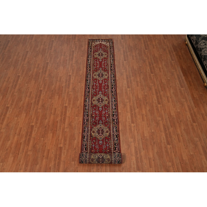 Tapis rouge à motif géométrique 3x21