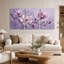 Ensemble de 3 toiles murales représentant des fleurs de magnolia roses et violettes sur une branche-134006866