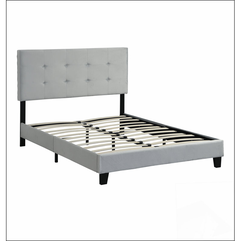 Structure de lit plateforme tapissier avec tête de lit capitonnée tirant, combinant style et confort pour une expérience de chambre à coucher luxueuse
