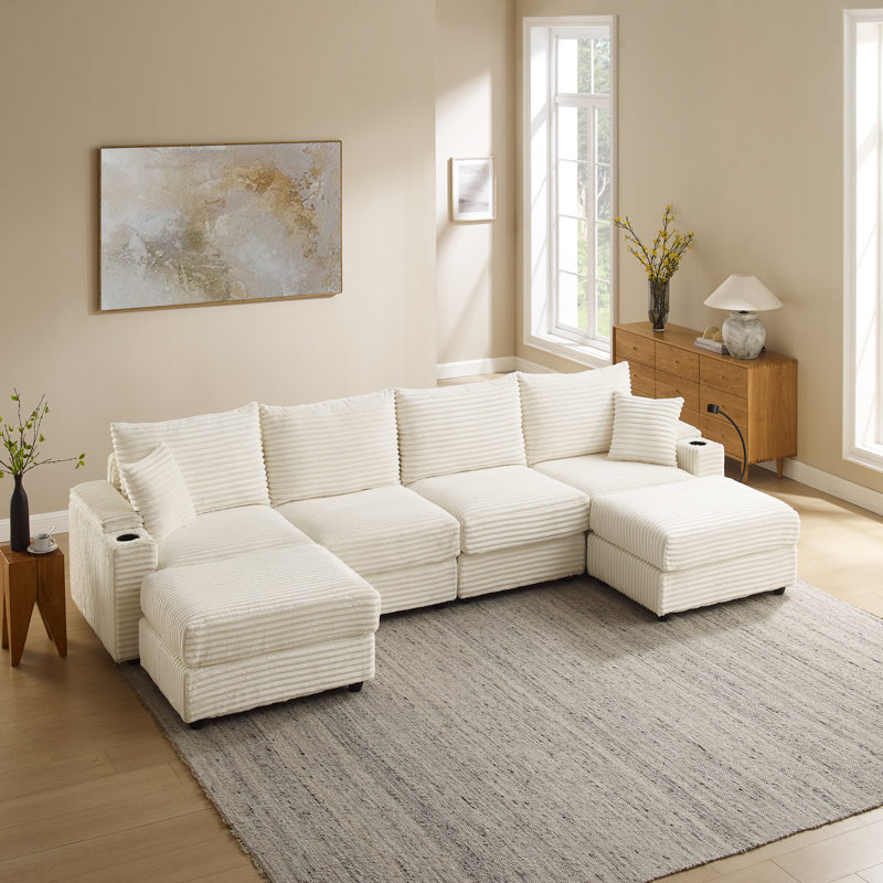 Canapé modulaire convertible avec accoudoirs de rangement cachés, repose-pieds mobile, 2 ports USB, 2 porte-gobelets, un support pour téléphone