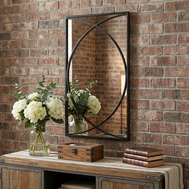 Ensemble de trois miroirs décoratifs en fer noir