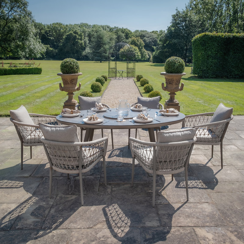 Anandi 6 - Person Patio Dining Set with Oval Table