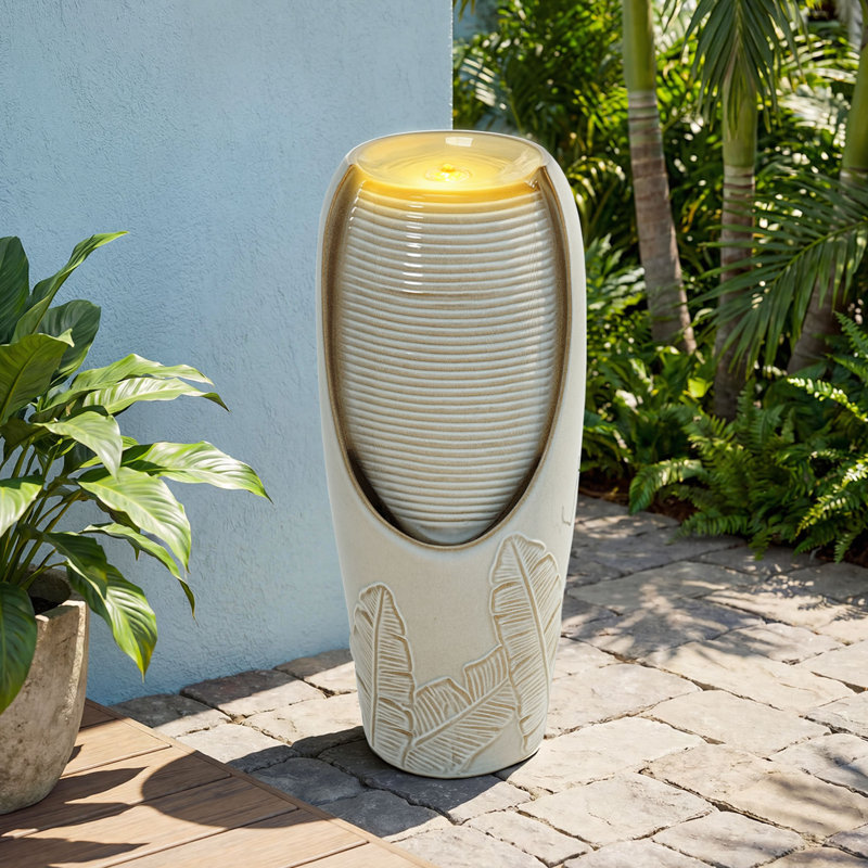 32" Ceramic Outdoor Water Fountain with LED Lights, Cascading Waterfall & 3D Tropical Leaf Embossed Jar in Beige Glaze for Patio Yard Porch Relaxation