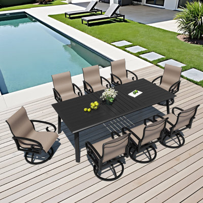 Ensemble de salle à manger de patio avec table en aluminium et chaises berçantes pivotantes Sunbrella (ensemble de 9)