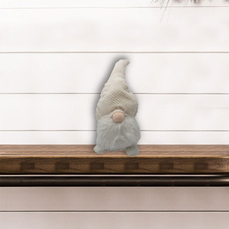 Gnome en tissu crème blanc flou