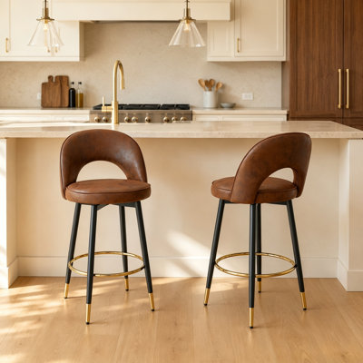 AriaHome 25" Faux Leather Swivel Counter Stools with Cutout Low Back and Gold Footrest (Set of 2)