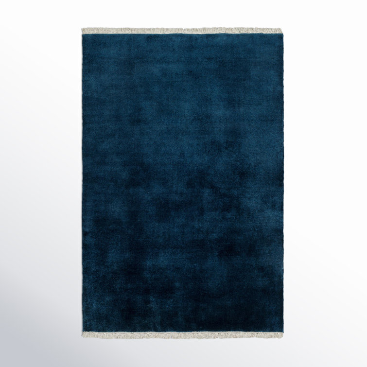 Clio Solid Color Hand Loomed Wool Area Rug in Blue