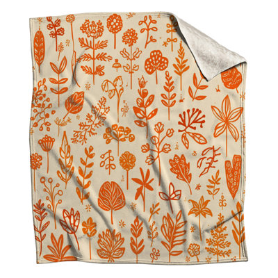 Couvertures orange avec illustrations botaniques