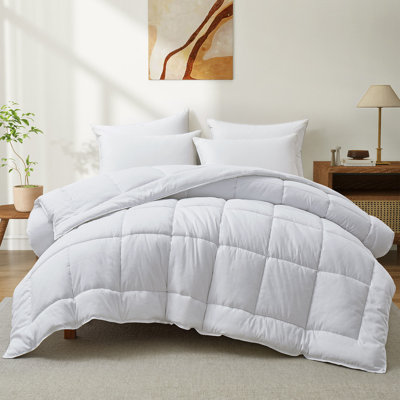 Édredon en duvet synthétique toutes saisons à motif géométrique