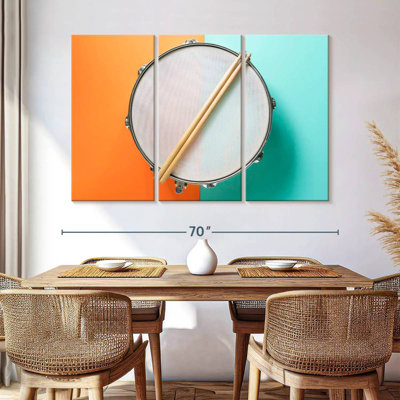 Drum And Sticks On Table