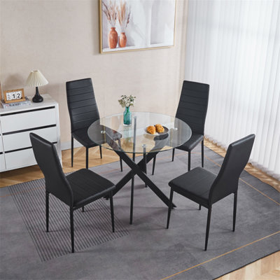 Table de salle à manger noire avec pieds en croix en métal et verre trempé