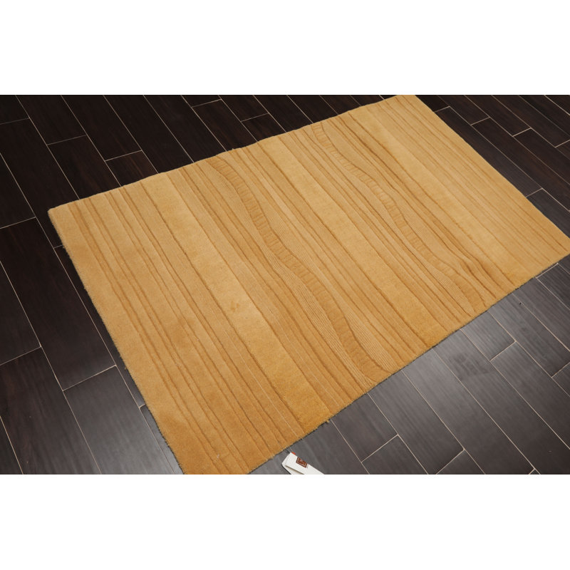 Tapis jaune en laine touffeté