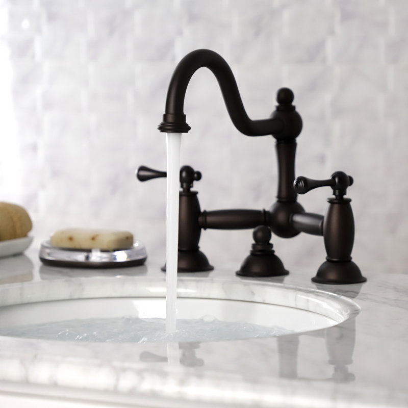 Kingston Brass Restoration Two-Handle 3-Hole Deck Mount Bridge Bathroom Faucet with Brass Pop-Up, Oil Rubbed Bronze