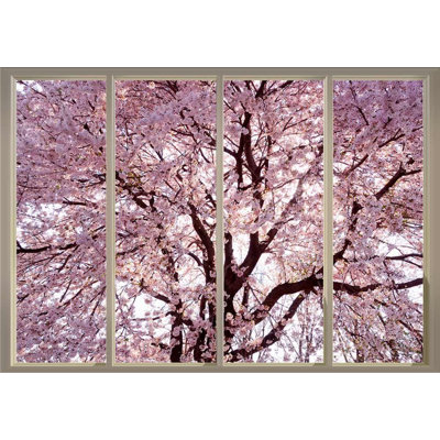Branches remplies de fleurs de cerisier roses