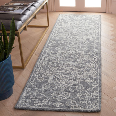 Tapis oriental bleu en coton touffeté Frachia