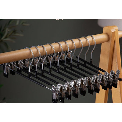 Cintre avec pinces pour pantalons