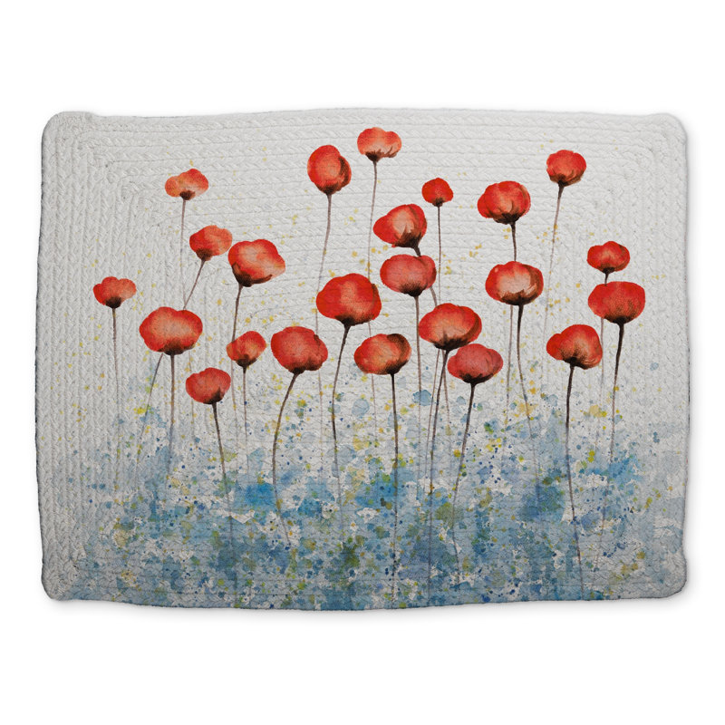 Fleurs rouges dans un napperon tressé champ bleu | Décoration intérieure