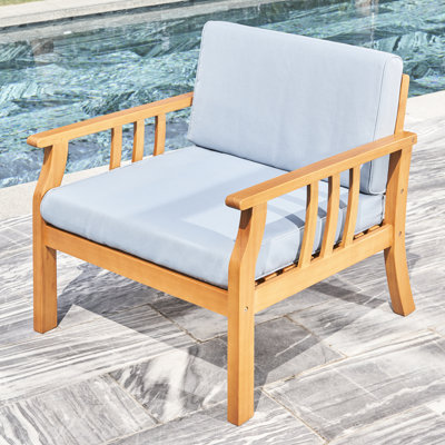 Chaise en bois massif miel et eucalyptus miel avec coussin extérieur, style nautique courbe en bois