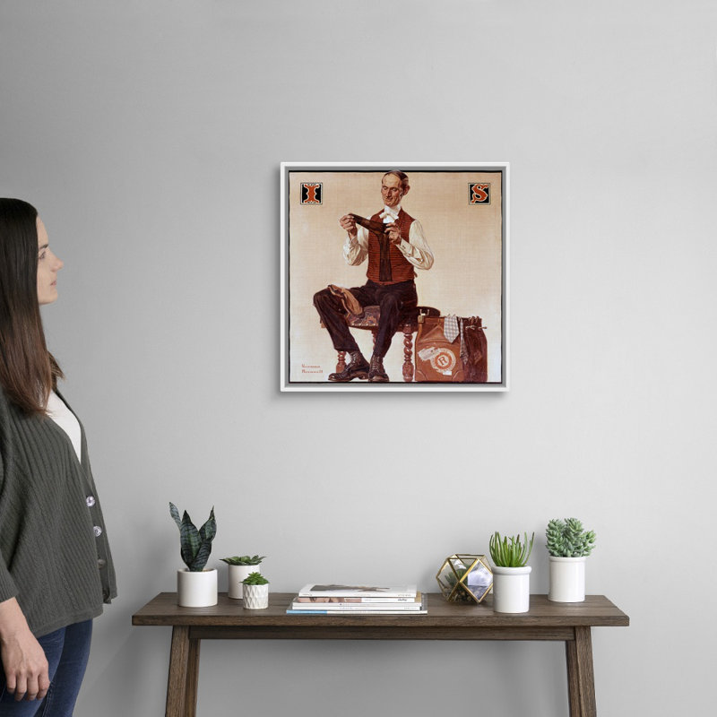 «Man Inspecting Socks», art mural sur toile, H 22 po x l 22 po x P 1,75 po, Cadre flottant blanc
