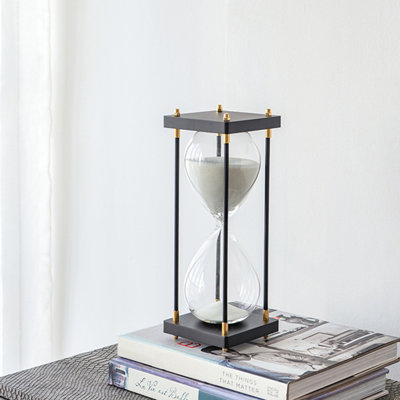 4.3" W x 4.3" D x 12" H hourglass with wooden and metal frame, white sand decorative tabletop sand timer