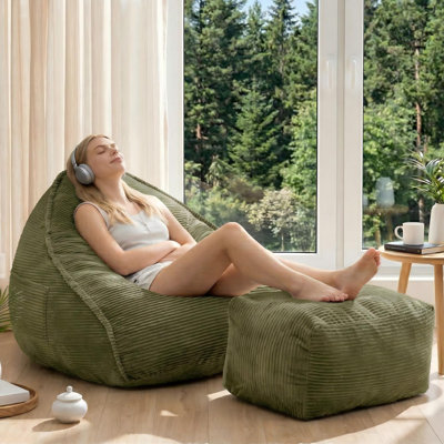 Grand fauteuil à billes avec repose-pieds et poche latérale pour adultes