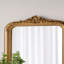 Miroir mural arqué 23,5X37,5 "avec écusson orné