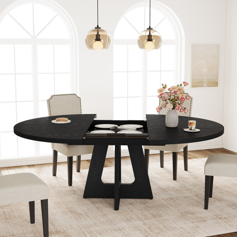 Table de salle à manger ronde extensible peu encombrante pour 4 à 8 personnes - Plateau de table moderne en panneau de fibres à densité moyenne avec structure en métal durable - réglable, multifonctionnelle, compacte - pour la cuisine, la salle à manger ou le salon - noir estampé