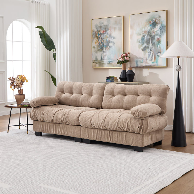 Canapé modulaire Cloud Couch avec assise profonde, revêtement en flanelle, configuration réglable, soutien des accoudoirs et coussins inclus.