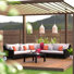 Ensemble de conversation modulaire en rotin de six articles avec housses de coussin Sunbrella