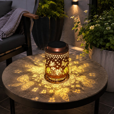 A metal butterfly solar light for outdoor garden, yard, patio, pathway, or porch decoration, positioned as a Mother's Day or birthday gift for women, Mom, Grandma, Sister, or Friend.